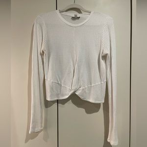 Topshop white long sleeve waffle knit shirt with front detail.